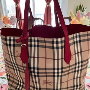 Burberry reversible red haymarket shoulder bag/tote. 
Authentic.